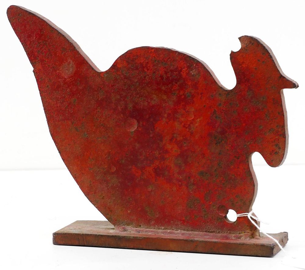 Lot 659: Cast iron turkey windmill weight