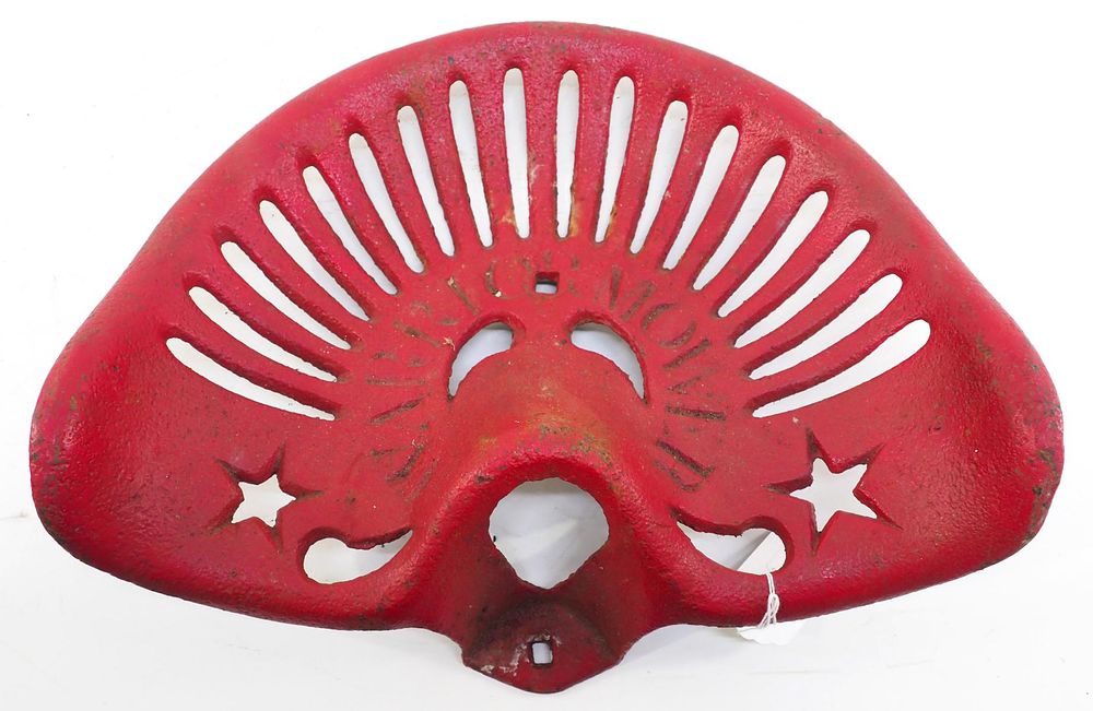 Lot 710: Warrior Mower cast iron seat