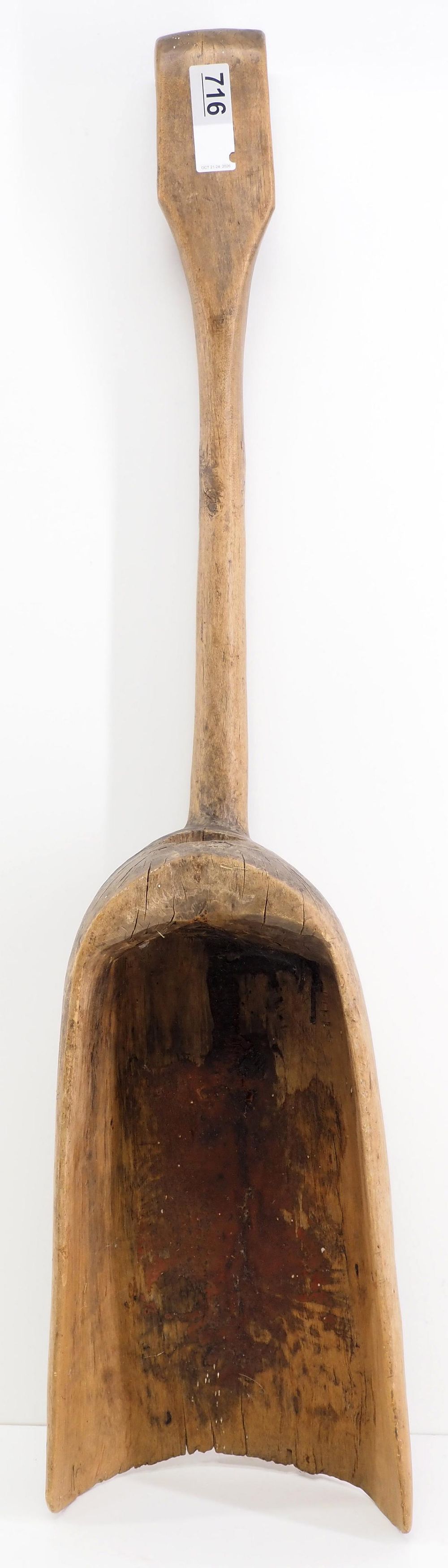 Lot 716: Unusual carved wooden scoop, 38"L