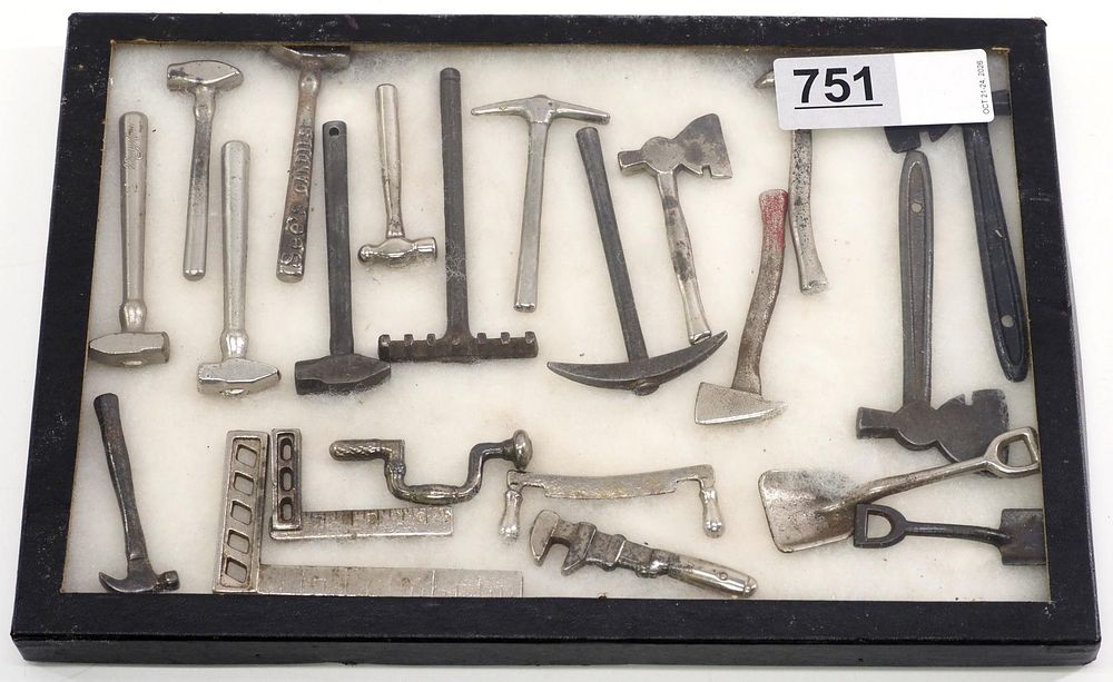 Lot 751: Display of (23) miniature tools