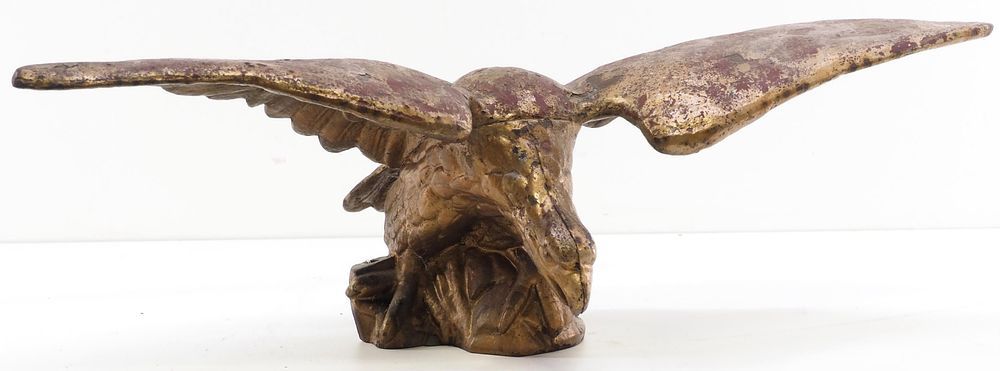 Lot 752: Cast iron eagle with red and gold paint