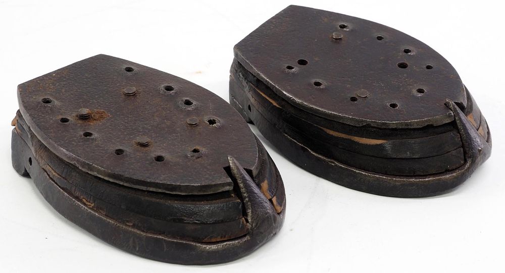 Lot 763: Set of horse shoes with wooden pads