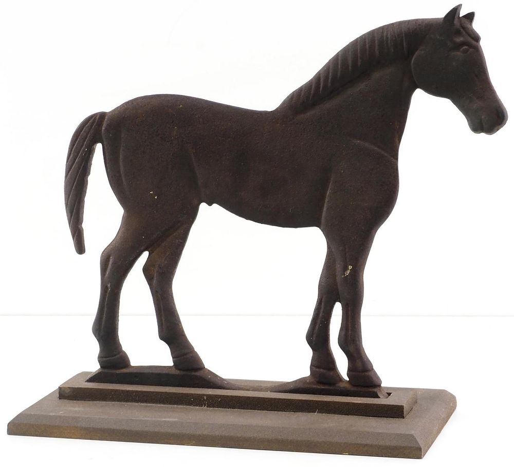 Lot 792: Cast iron crescent-tail horse windmill weight