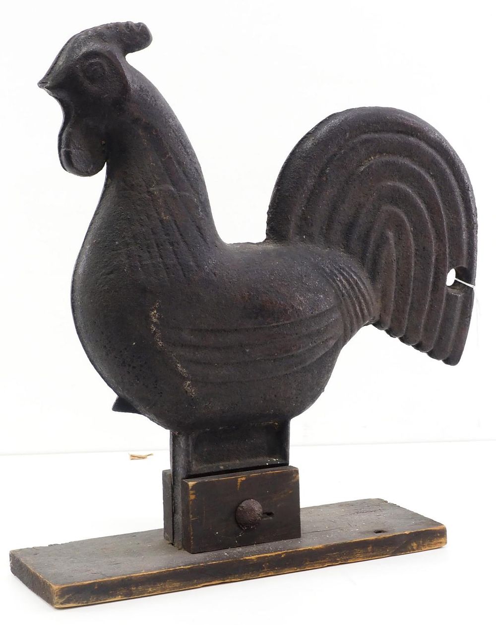 Lot 798: Cast iron rainbow-tail rooster windmill weight