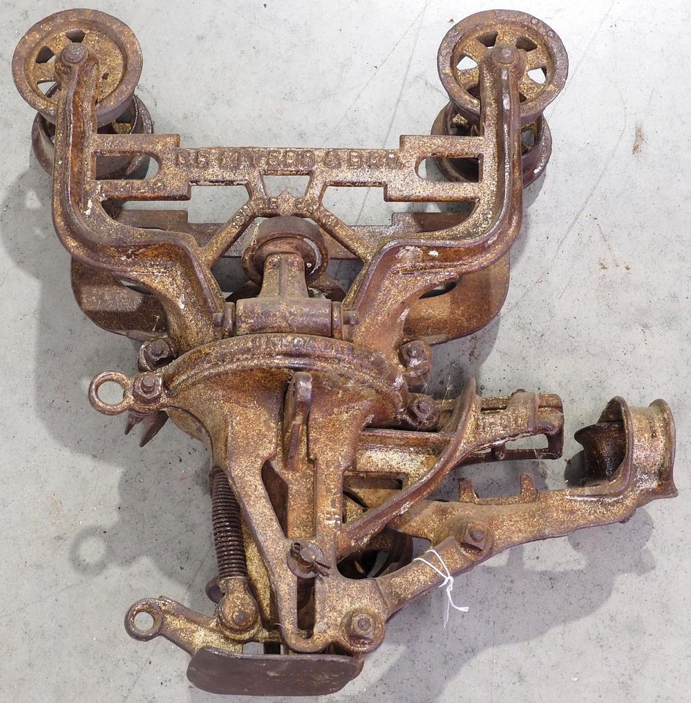 Lot 888: FE Myers Sure Grip Unloader cast iron hay car