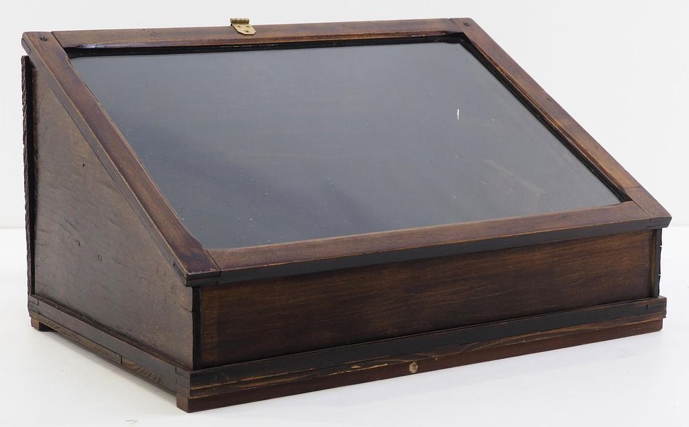 Lot 1017: Country store slant-front showcase