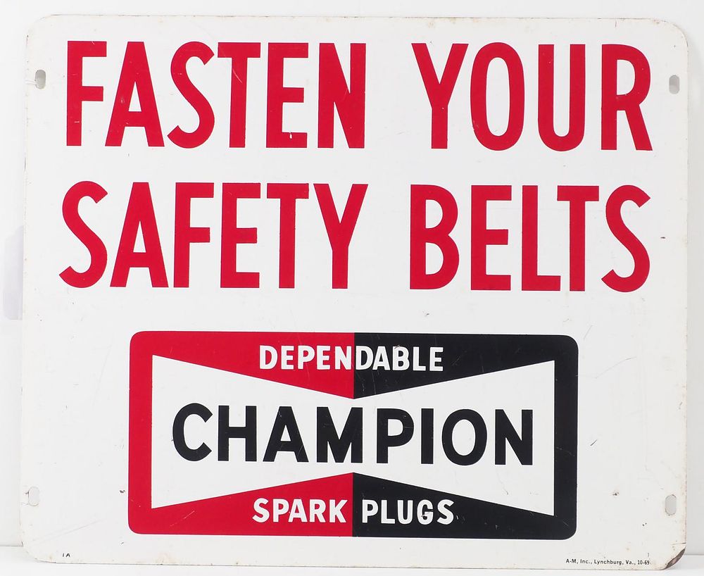 Lot 1022: Champion Spark Plugs sign