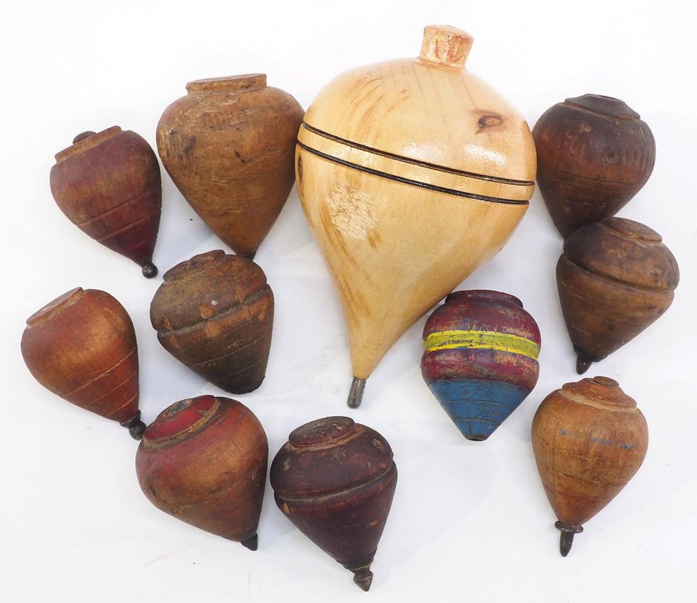 Lot 1026: (11) Early wooden child's tops
