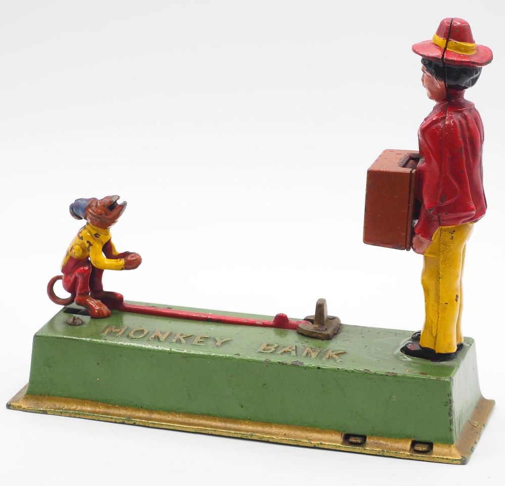 Lot 1049: "Monkey and Organ Grinder" mechanical bank