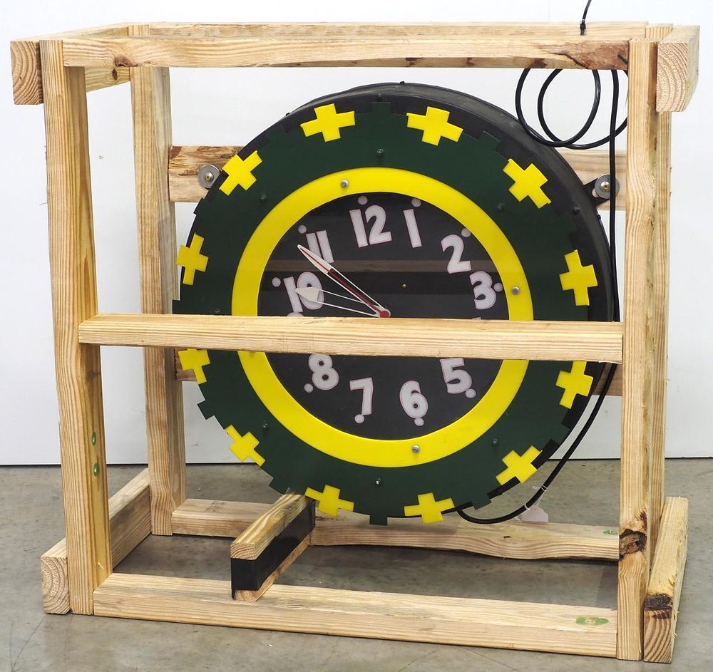 Lot 1200: Aztec-style neon advertising clock