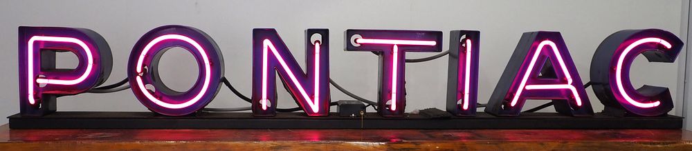 Lot 1205: Neon Pontiac dealer sign