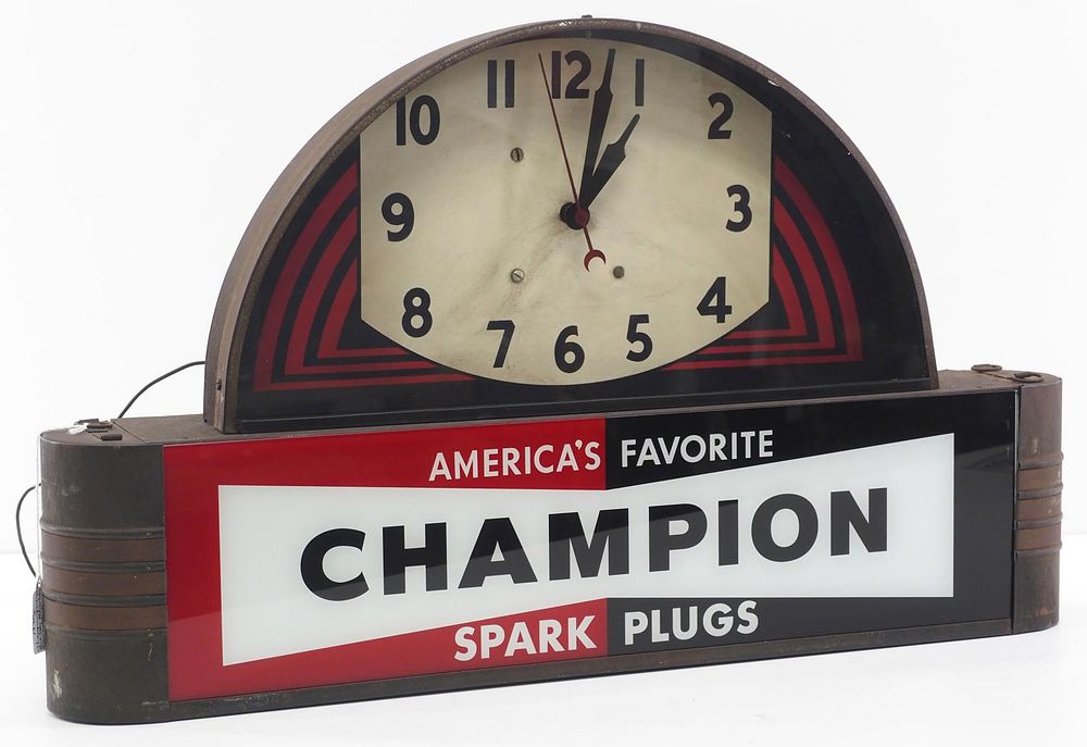 Lot 1230: 1930's Champion Spark Plugs lighted clock