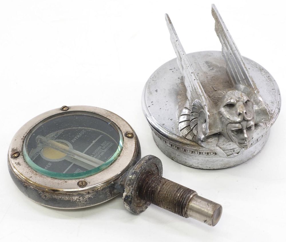 Lot 1312: Boyce Moto Meter & fancy radiator cap