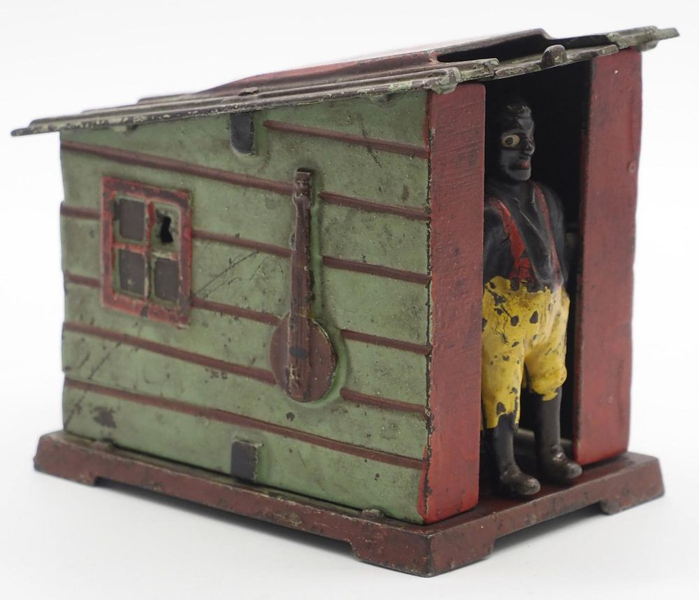 Lot 1322: "Cabin" cast iron mechanical bank