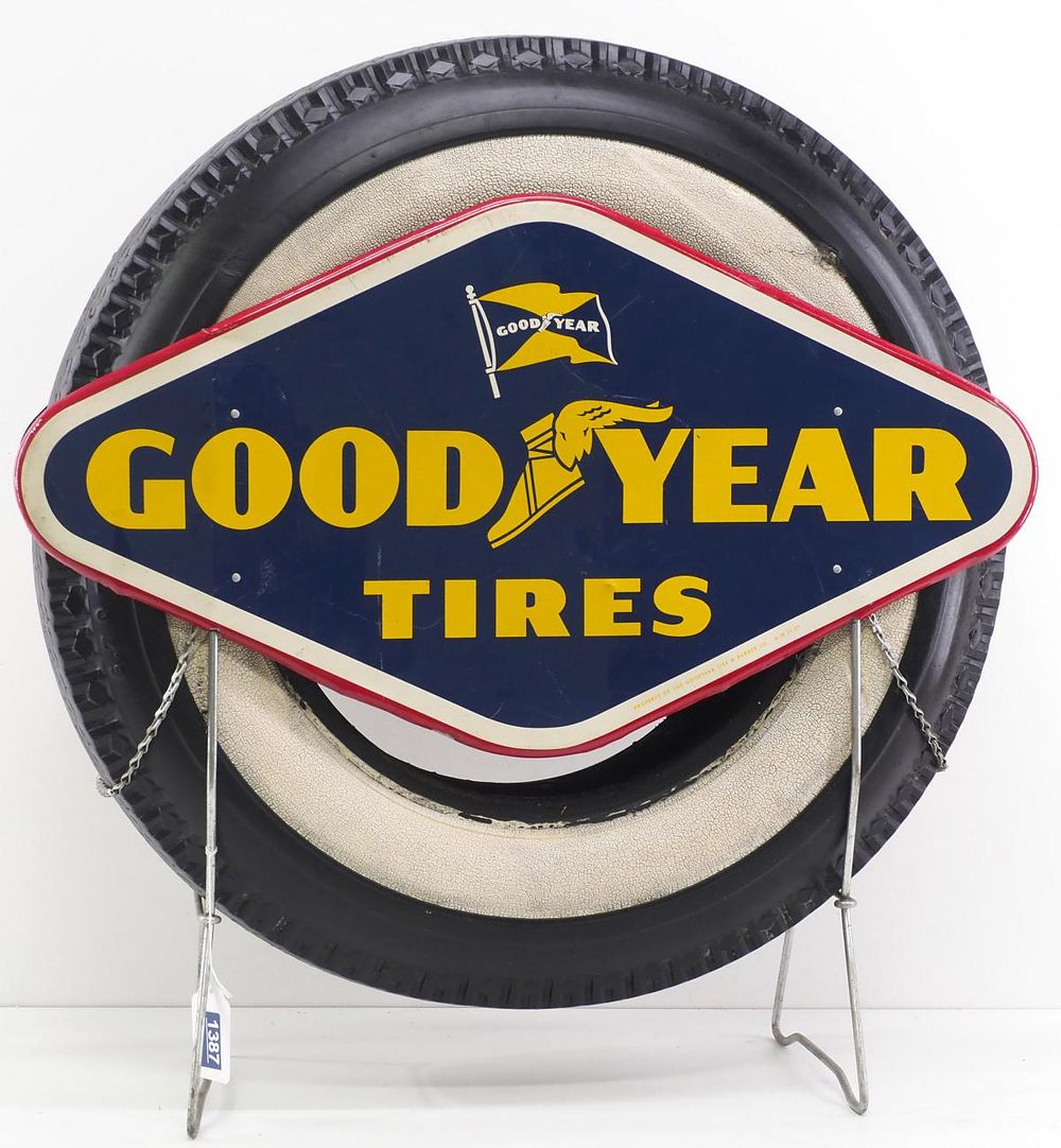 Lot 1387: Goodyear 2-sided tire display with tire