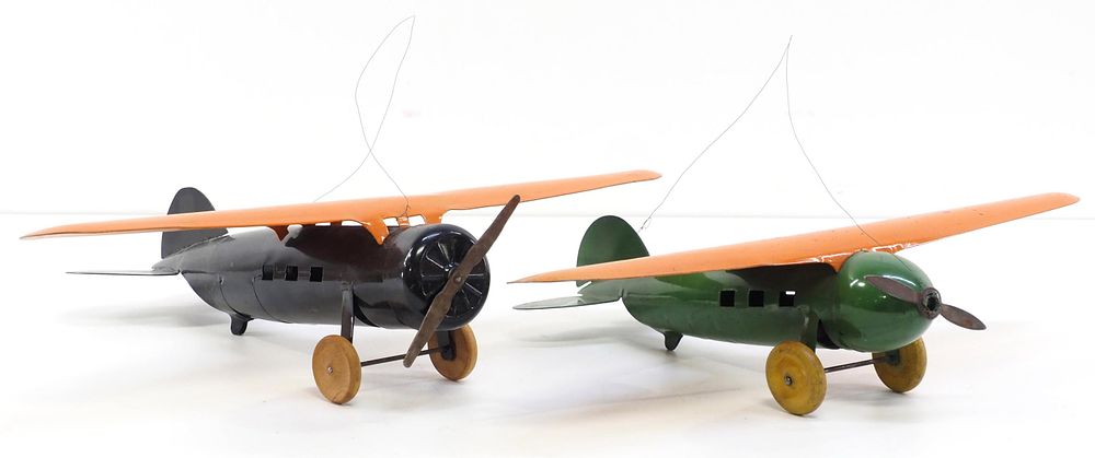 Lot 1408: (2) Pressed steel toy airplanes