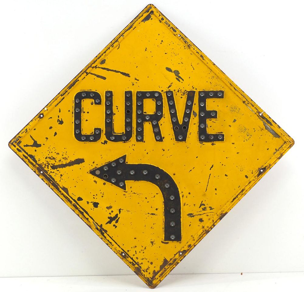 Lot 1416: Curve road sign with cat eye reflectors