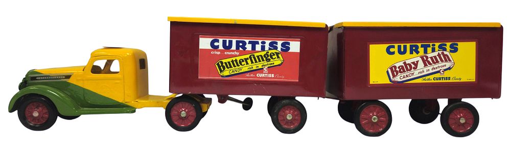Lot 5215: 1930's Buddy L Curtiss Candy Tandem Truck
