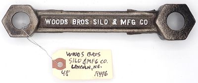 "Woods Bros Silo & Mfg Co", on back "The Hinge Door Silo", R496