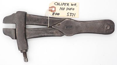 10''L Caliper-type adjustable wrench, no info