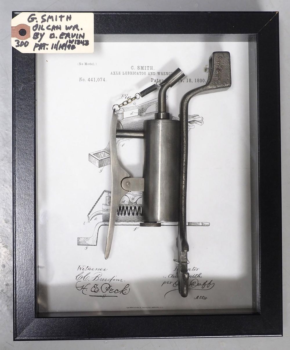 Lot 300: G. Smith axle lubricator and wrench