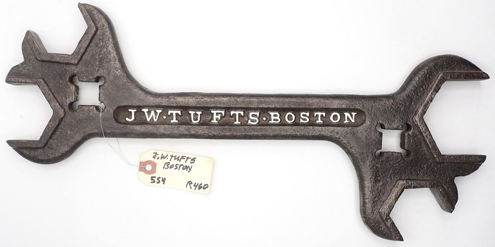 Lot 554: 17.75''L "JW Tufts. Boston"