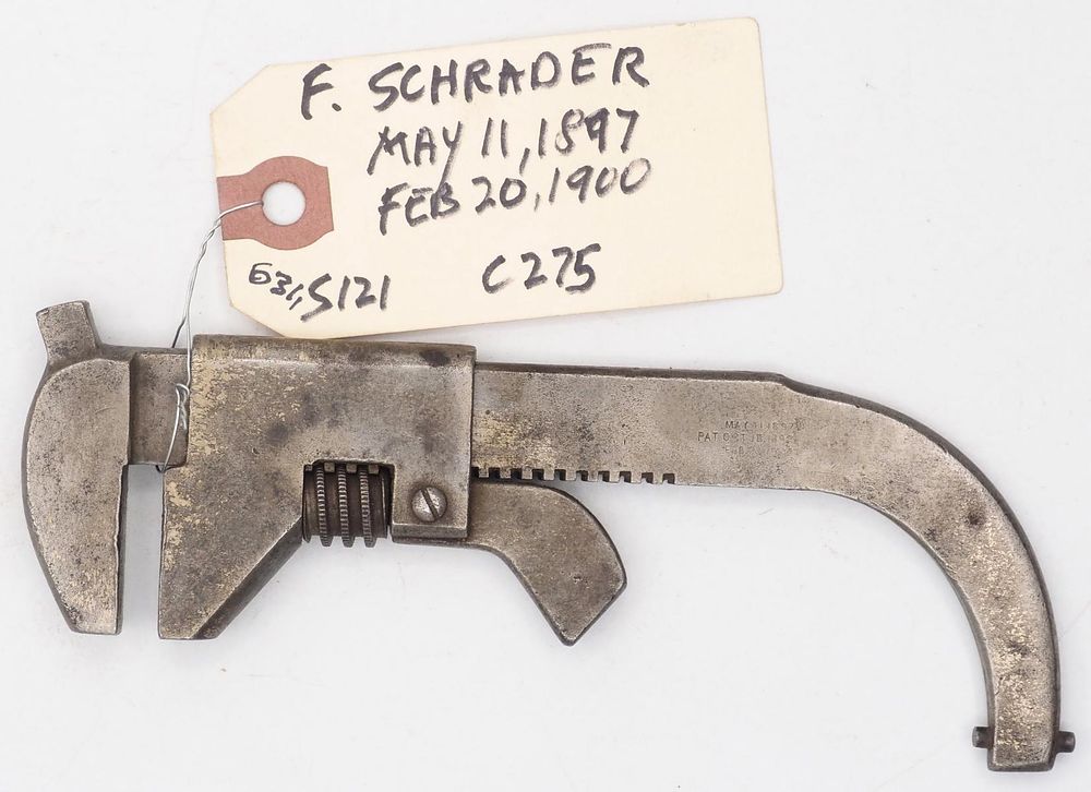 Lot 631: E. Schrader with nub on jaw