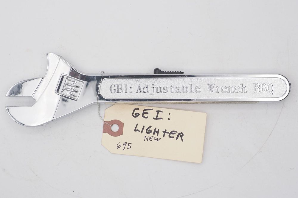 Lot 695: 9''L "GEI: Adjustable Wrench BBQ" lighter