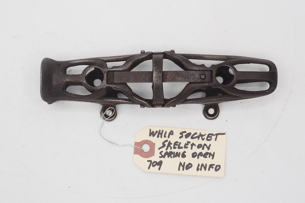 Lot 709: 6.75''L Whip socket, ornate skeleton type