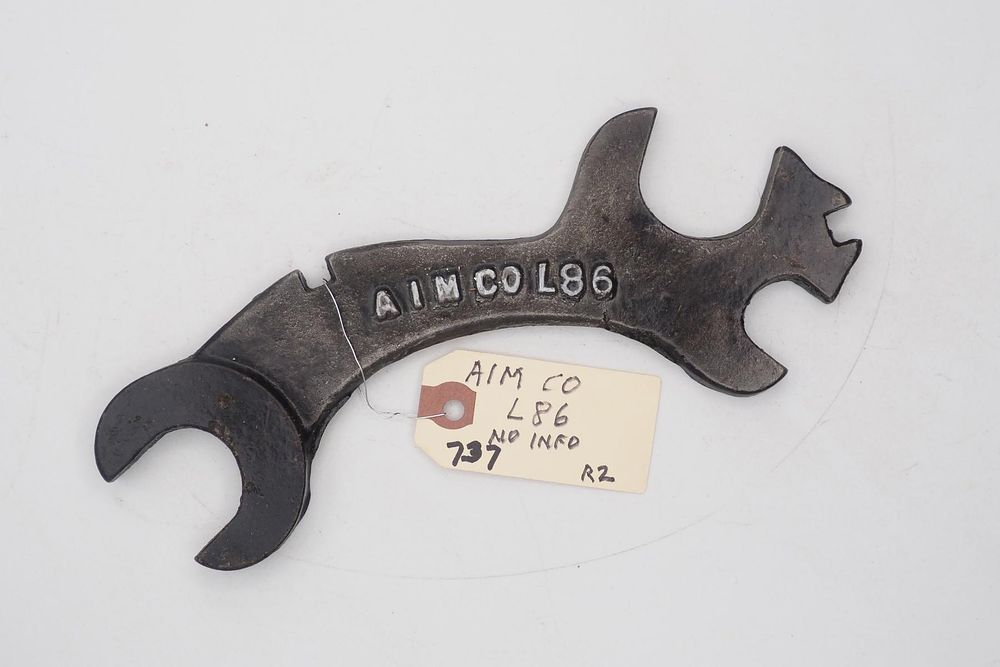 Lot 737: 9.25''L "AIM Co L86", unknown, R2