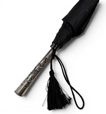 Silver Handled Umbrella. Handle marked "800." Umbrella length approximately 26.37in. Handle 