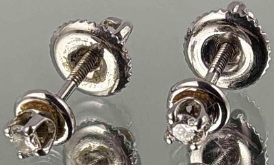 14K White Gold Diamond Earrings, 1.1g. Marked "14KT." Earrings approximately 4.0mm. Diamonds 