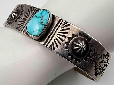 Navajo Hand Stamped Sterling Silver Turquoise Cuff Bracelet, 40.3g. Marked "Sterling." Signed 