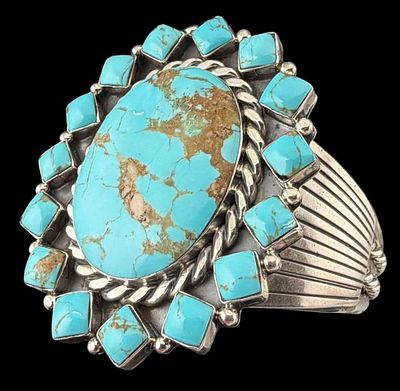 Navajo Sterling Silver Turquoise Cuff Bracelet, 77.8g. Marked "925." Signed with bear 