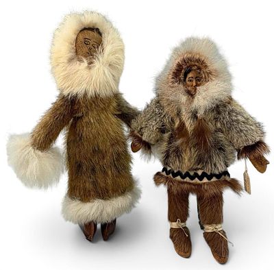Two Vintage Alaskan Fur-Dressed Dolls. Two Alaskan dolls in traditional-style fur parkas and 