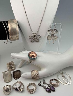 Grouping Of Sterling Silver Jewelry, 150.6g. Pieces marked or test as sterling. Cuff bracelet 