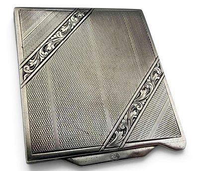 Engraved Art Deco 900 Silver Compact, 75.9g. Marked "900." Approximately 2.85L x 2.65W in. ALL 