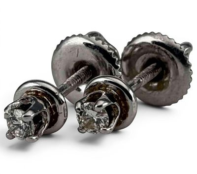 14K White Gold Diamond Earrings, 1.1g. Marked "14KT." Earrings approximately 4.0mm. Diamonds 