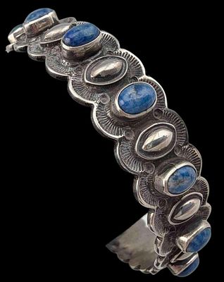 Donovan Cadman, Navajo Hand Stamped Sterling Silver Bracelet, 54.4g. Signed, marked "Sterling." 