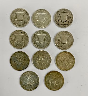 לוט 11 מטבעות חצי דולר אמריקאי מתוארך 1952-1968, כסף 900, משקל 134 גרם סה"כ