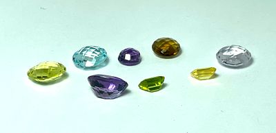 8 אבני חן - אמטיסט-ציטרין -טופז דבש מעולה-בלו טופז-פרידוט-רוז קוורץ- סה''כ 35 CT