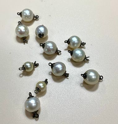 לוט 11 פנינים עם מוט מתכת נשלף בכל אחת מהם משקל 14.3 גרם