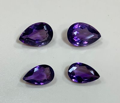 2 זוגות של אמטיסט בליטוש טיפה במשקל כולל 8.02 ct צבע וברק חזק ללא תעודה