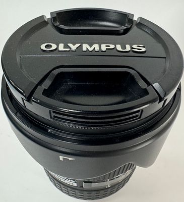 עדשת OLYMPUS אולימפוס Zuiko Digital ED 12-60mm f/2.8-4 SWD עם פילטר זכוכית 72mm עם תוספת נגד 