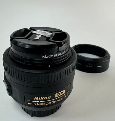 עדשת NIKON ניקון יפן Nikkor 35mm F/1.8G AF-S DX F-Mount עם פילטר Carl Zeiss T 52mm מצב כללי טוב 