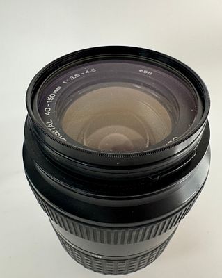 עדשת OLYMPUS אולימפוס M.Zuiko Digital 40-150mm F/4-5.6 ED MSC עם פילטר Hama UV390 HTMC 55mm מצב 