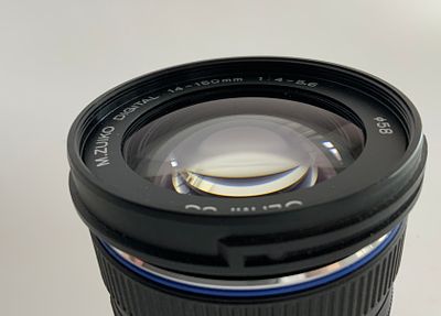 עדשת OLYMPUS אולימפוס Olympus Zuiko Digital 14-150mm F/4-5.6 ED Lens Japan F/4-5.6 מצב כללי 