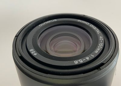 עדשת OLYMPUS אולימפוס Olympus 40-150mm F/4-5.6 ED Lens Japan F/4 מצב כללי כחדש ללא שריטות כלל