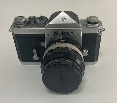 מצלמת עם עדשה NIKON ניקון f/2.8 6443647. יפני 24mm NIPPON KOGAKU מצב טוב מאוד עם עדשת HAMA HTMC