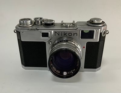 מצלמה עם עדשה NIKON ניקון f/2 6186786. יפני NIPPON KOGAKU 50mm מצב משומש טוב עם פילטר של canon מקורי